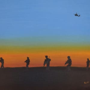 Soldier silouhettes patrolling at sunset with a helicopter flying in the distance.